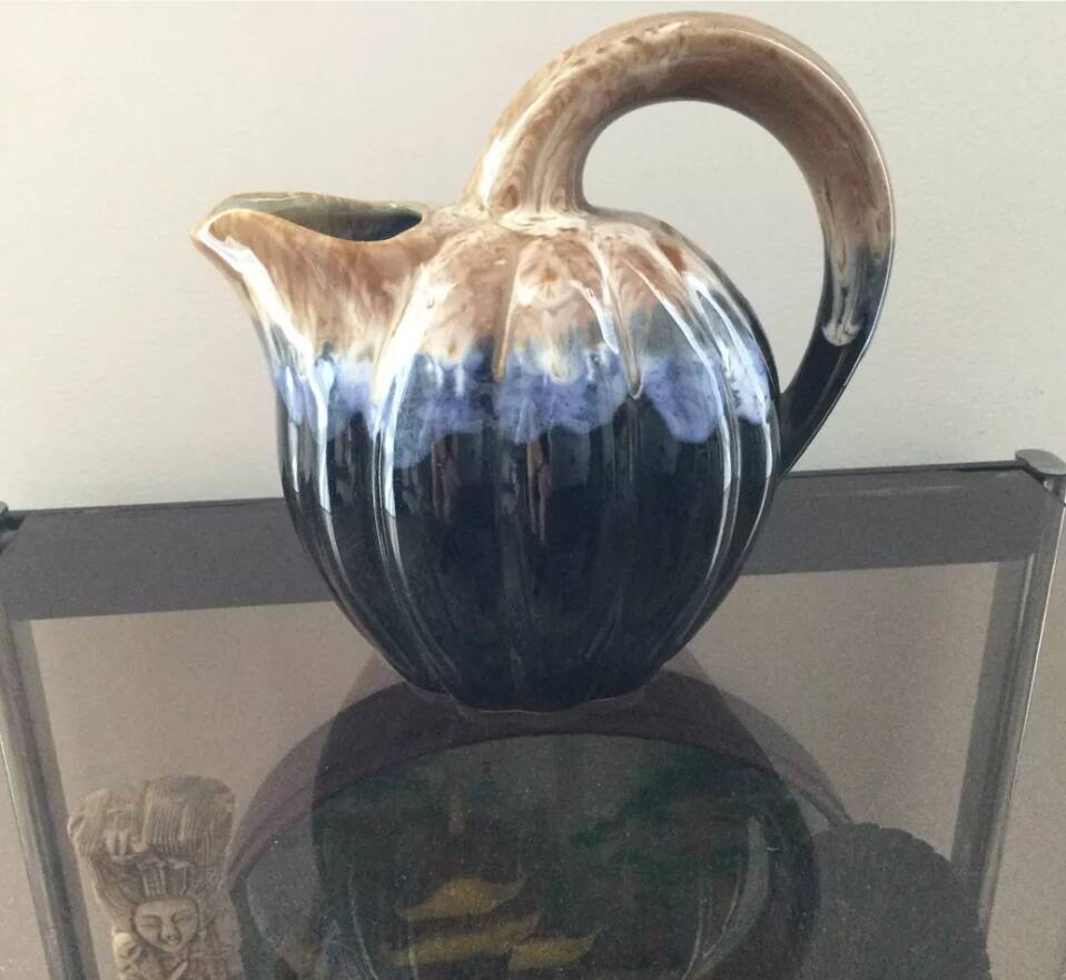 Ceramic melon jug signed
