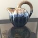 Ceramic melon jug signed