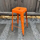 Orange metal workshop stool