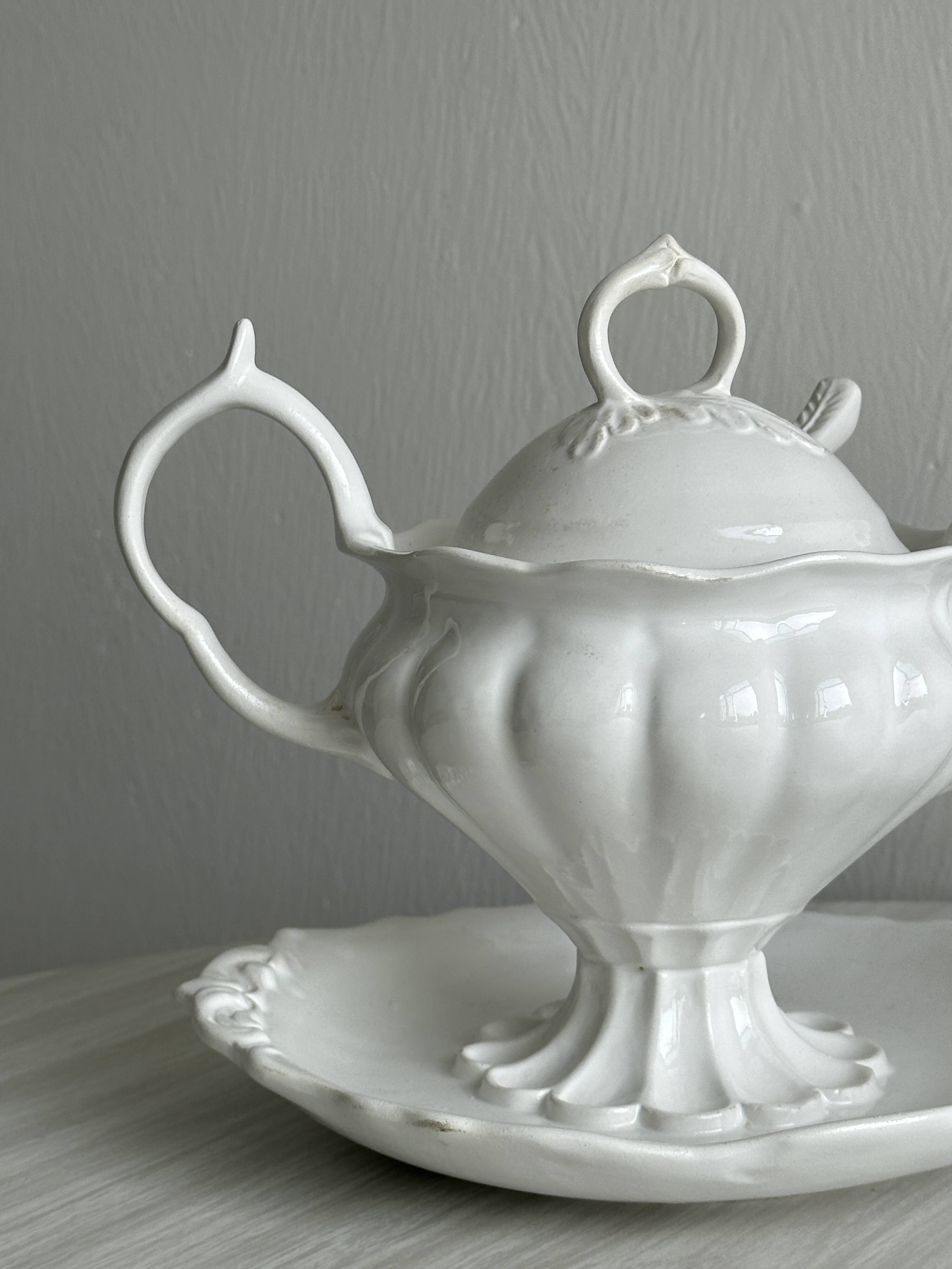 Antique white porcelain sauce boat