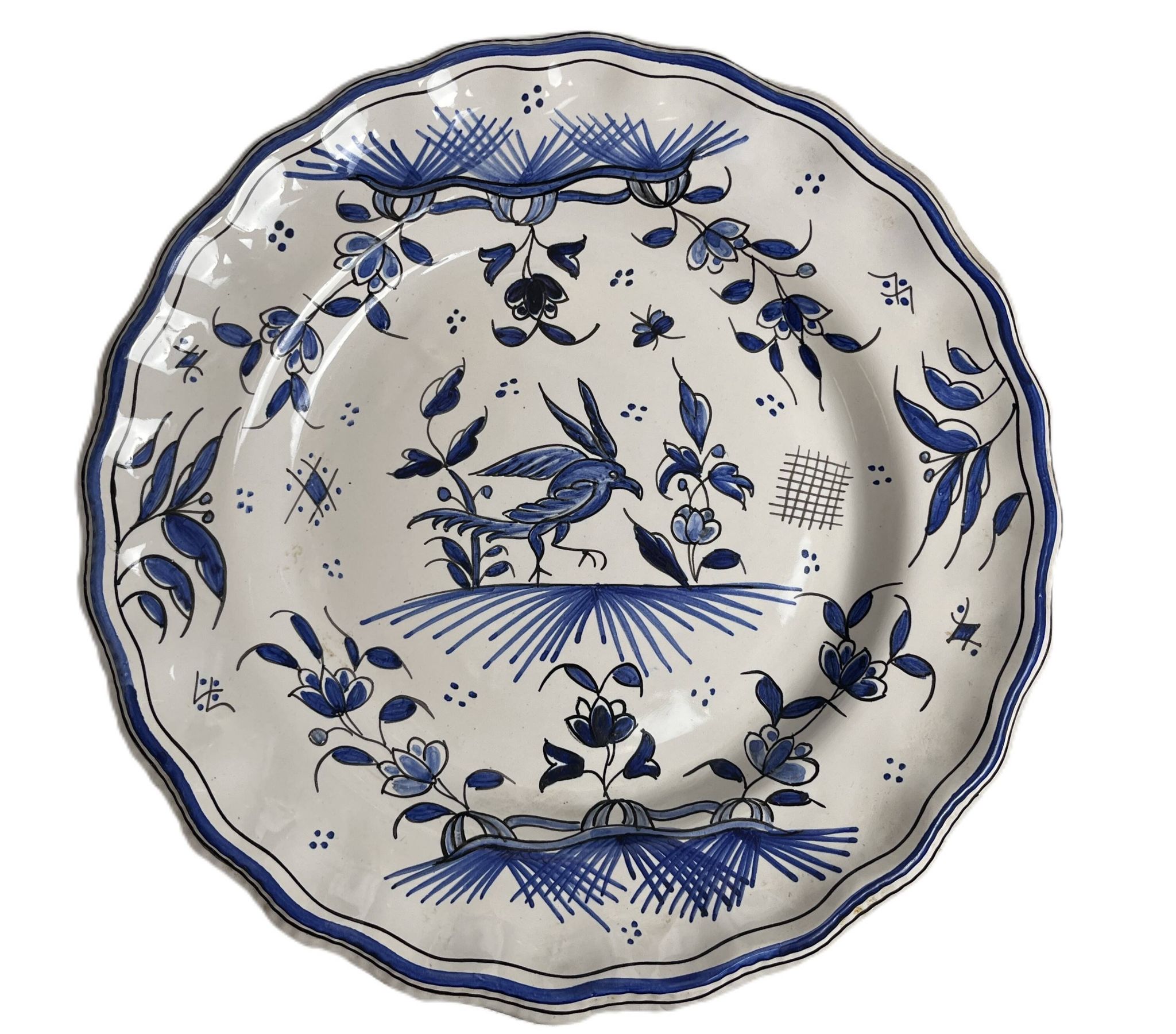 Moustiers, pairs of plates with wading bird design, scalloped edge, early 20th century.