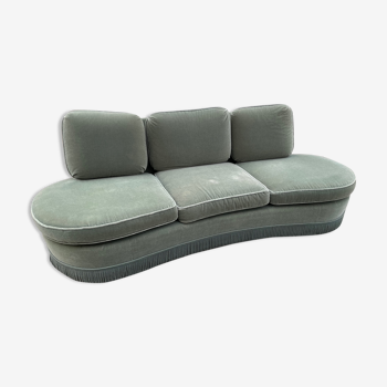 Rounded sofa with fringes