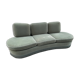 Rounded sofa with fringes