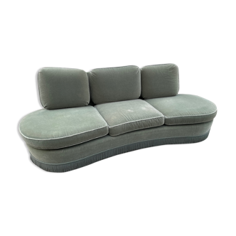 Rounded sofa with fringes