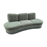 Rounded sofa with fringes