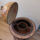 Vintage globe bar with storage for bottles and glasses.