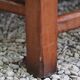 Wooden-backed bench with straw seat, 1970s.