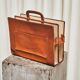 Trompe-l'Oeil magazine rack 'Actentasche' in patinated leather and canvas