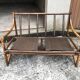 2-seater rattan sofa with vintage velvet cushions from the 70s