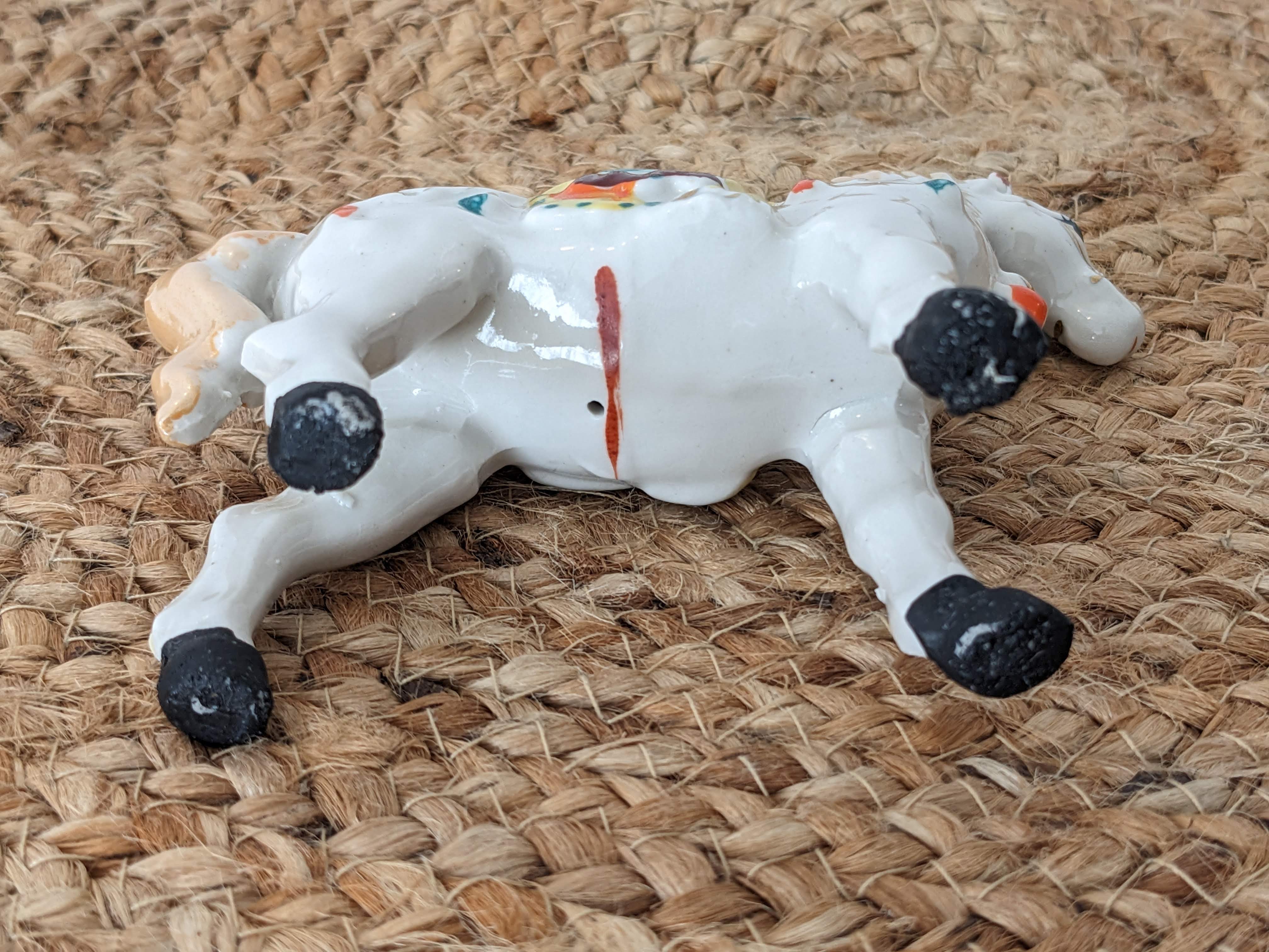 Painted porcelain horse statuette
