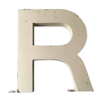 Old vintage signboard letter r