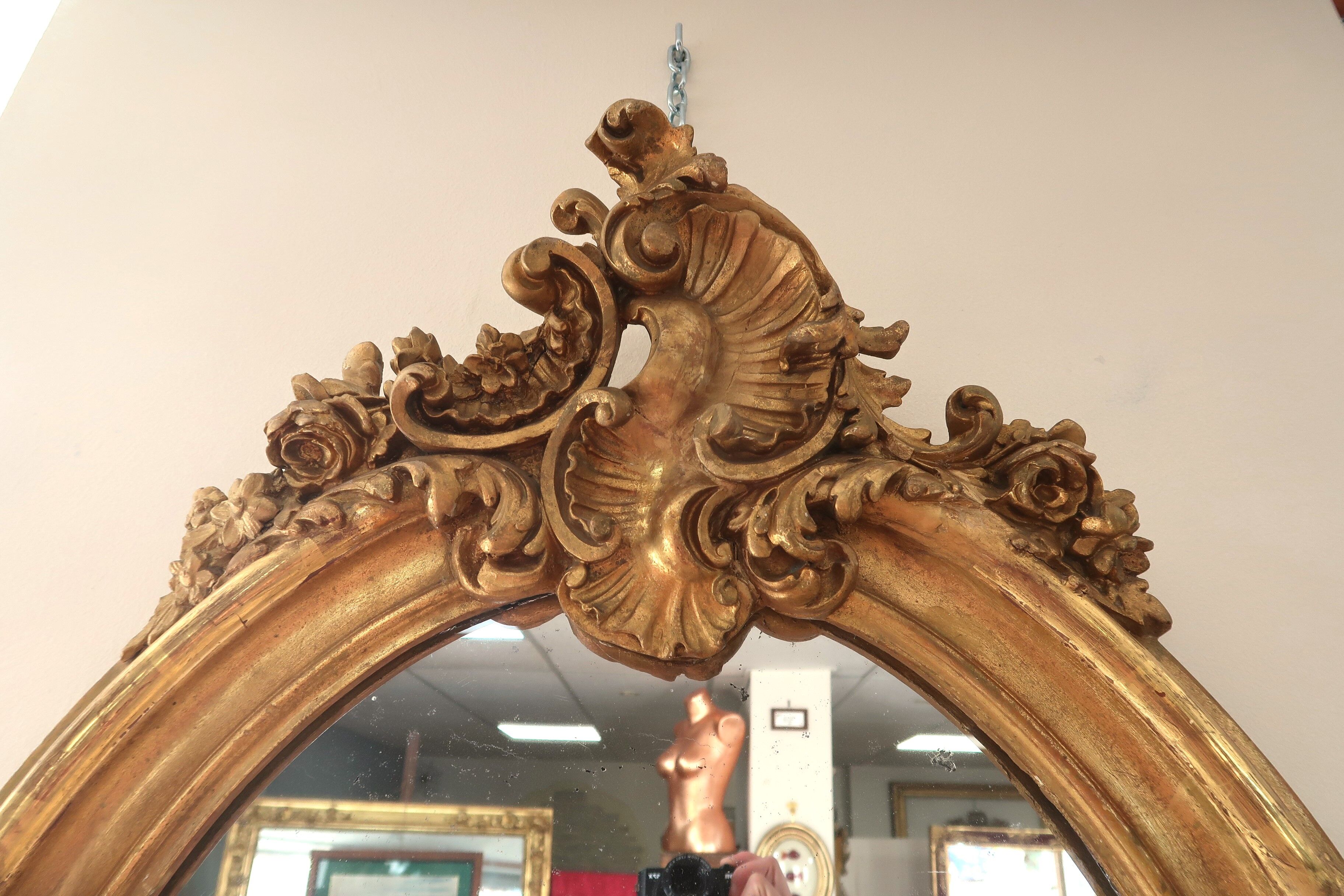 Oval mirror in gilded wood 98x63 cm