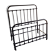 old bed with vintage painted metal bars