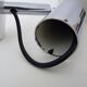 Adjustable wall spotlight in chrome-plated and white lacquered metal. 1970s