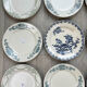 6 green and blue mismatched iron earth plates