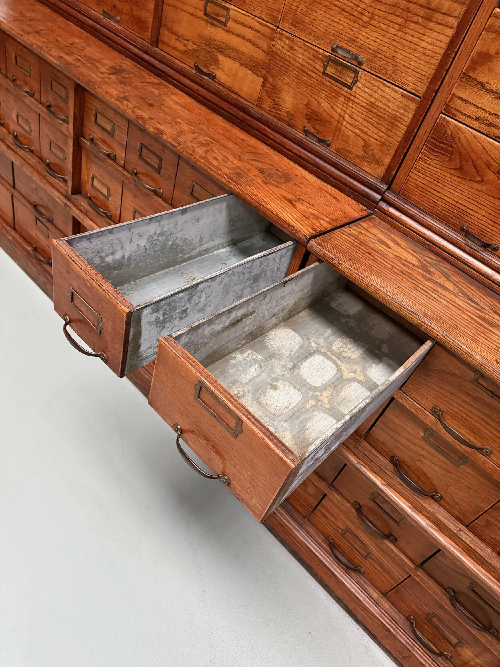 Antique very large American oak grain / apothecary cabinet, ca 1900