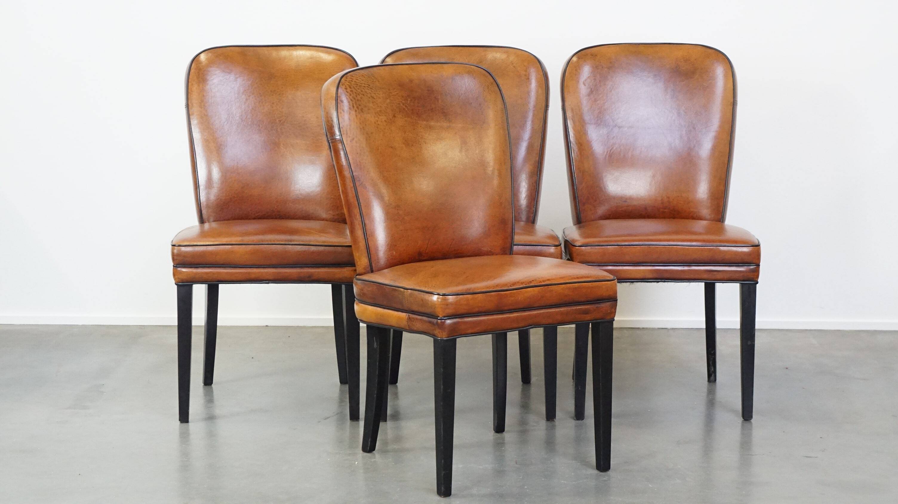 4 chaises de salle à manger en cuir de mouton marron