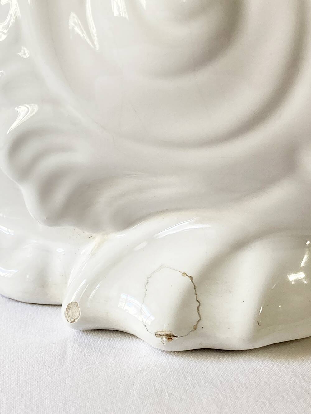 White ceramic fish plant pot