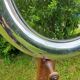 Round mirror of the 70s chromed by Reggiani Lampadari