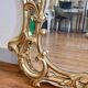 Large gold mirror in Louis XV style