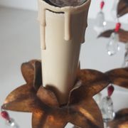 Gold metal chandelier and stamps