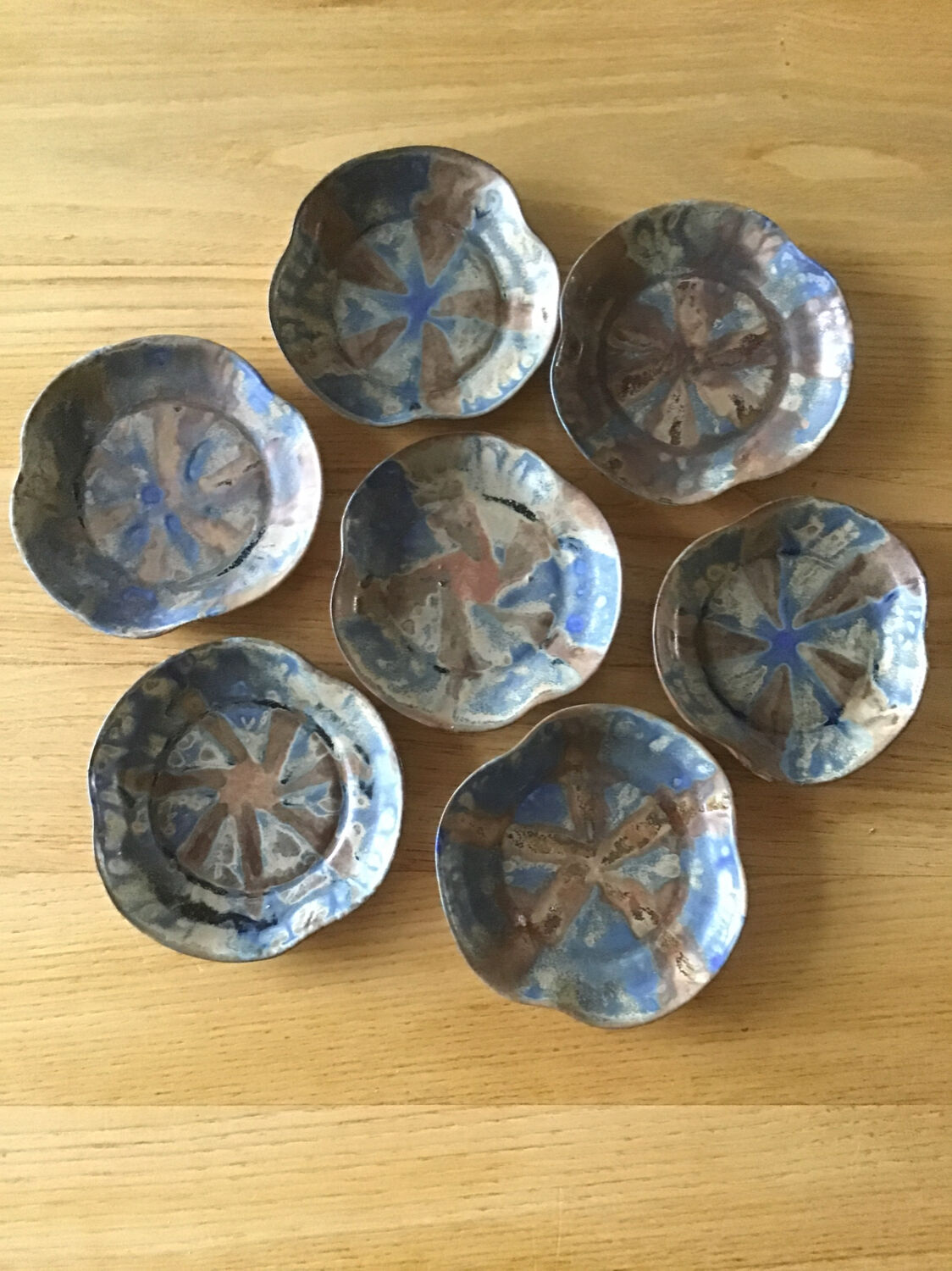7 stoneware cups signed G Méténier