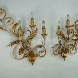 Pair of large floral wall lamps in gilded and lacquered metal. Italy 1960s