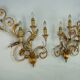 Pair of large floral wall lamps in gilded and lacquered metal. Italy 1960s