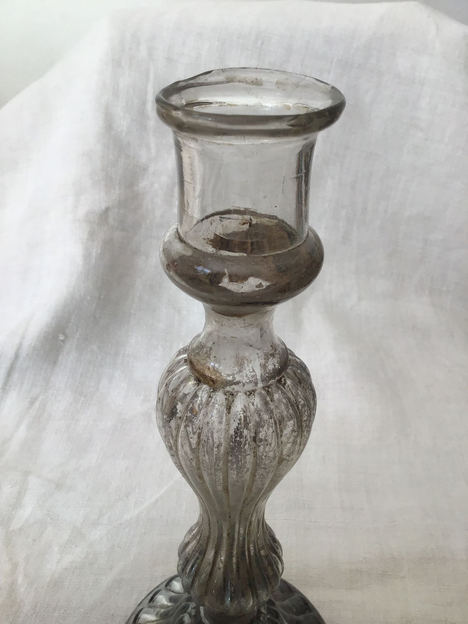 Eglolated glass candlestick