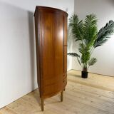 Mid-century modern corner furniture in teak with doors.