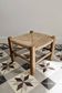 Vintage low stool in wood and straw – Woven straw seat