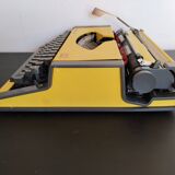 Vintage yellow portable typewriter, functional, AEG, new ribbon
