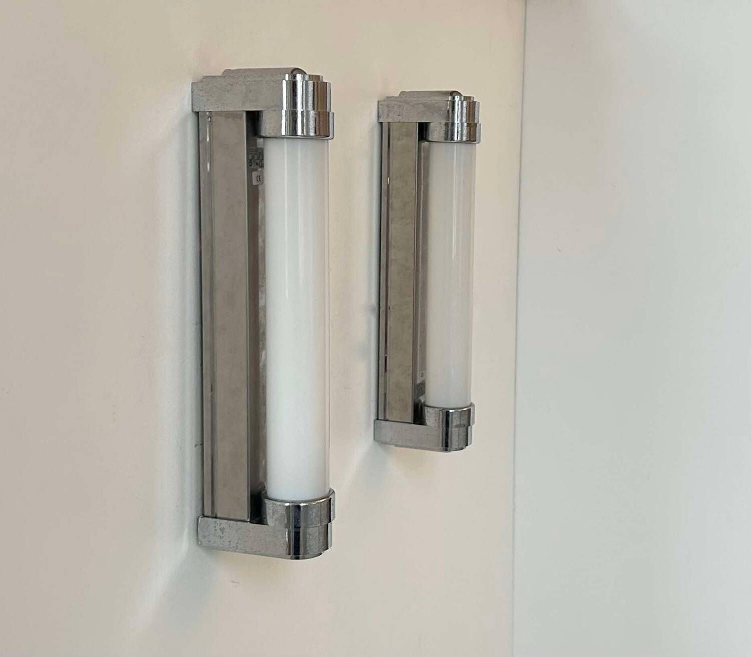 Pair of vintage wall lights, chromed metal, Italy 1970