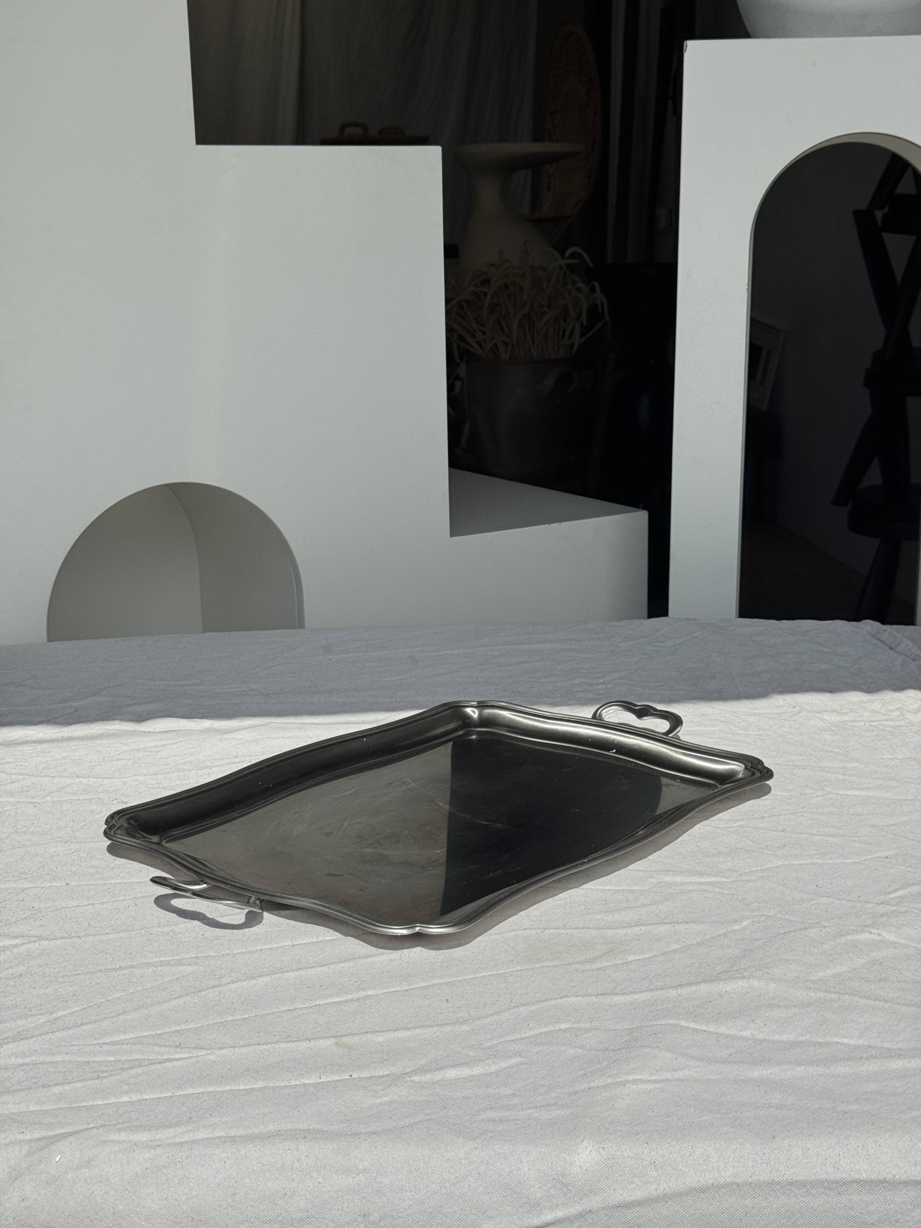 Guy Degrenne silver stainless steel serving tray with an eventful shape