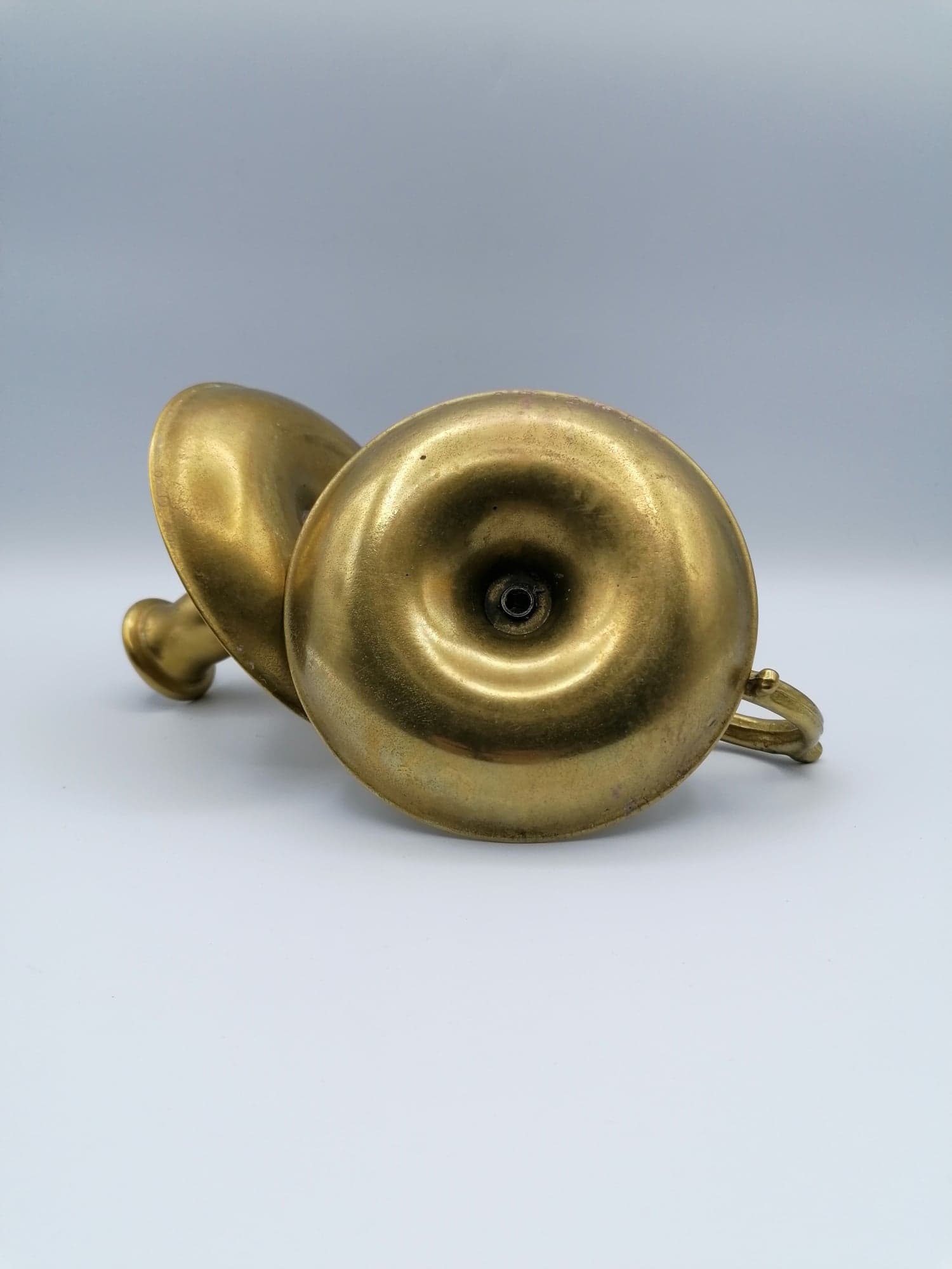 Pair of brass hand candlesticks