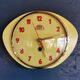 Vintage formica clock silent wall pendulum "FFR Morbier yellow red"