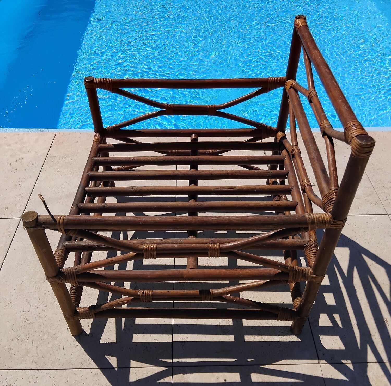 Vintage wooden garden furniture set with a bench and an armchair
