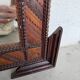 Pair of wooden mirrors in tramp art style