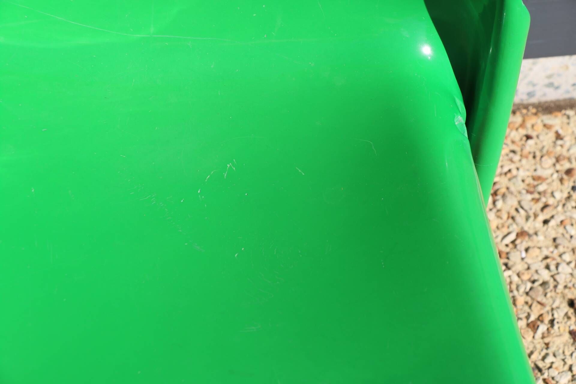Set of 4 green Selene Magistretti chairs.