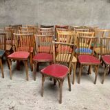 Series of 25 vintage Baumann bistro chairs in curved wood sitting Skaï or wood