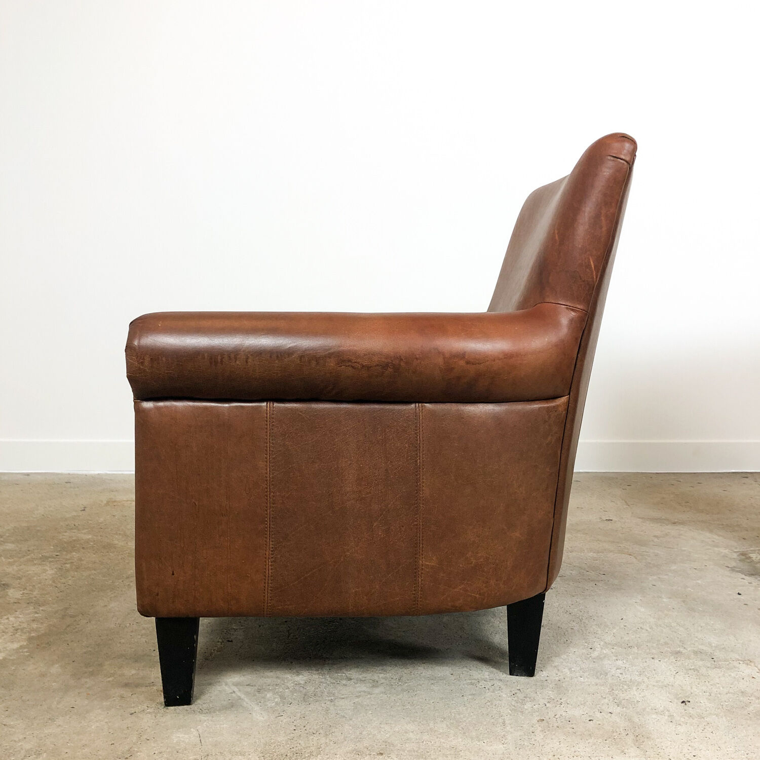 Set of two vintage leather armchairs