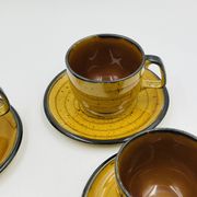 Set of four vintage Boch Palma cups and saucers.
