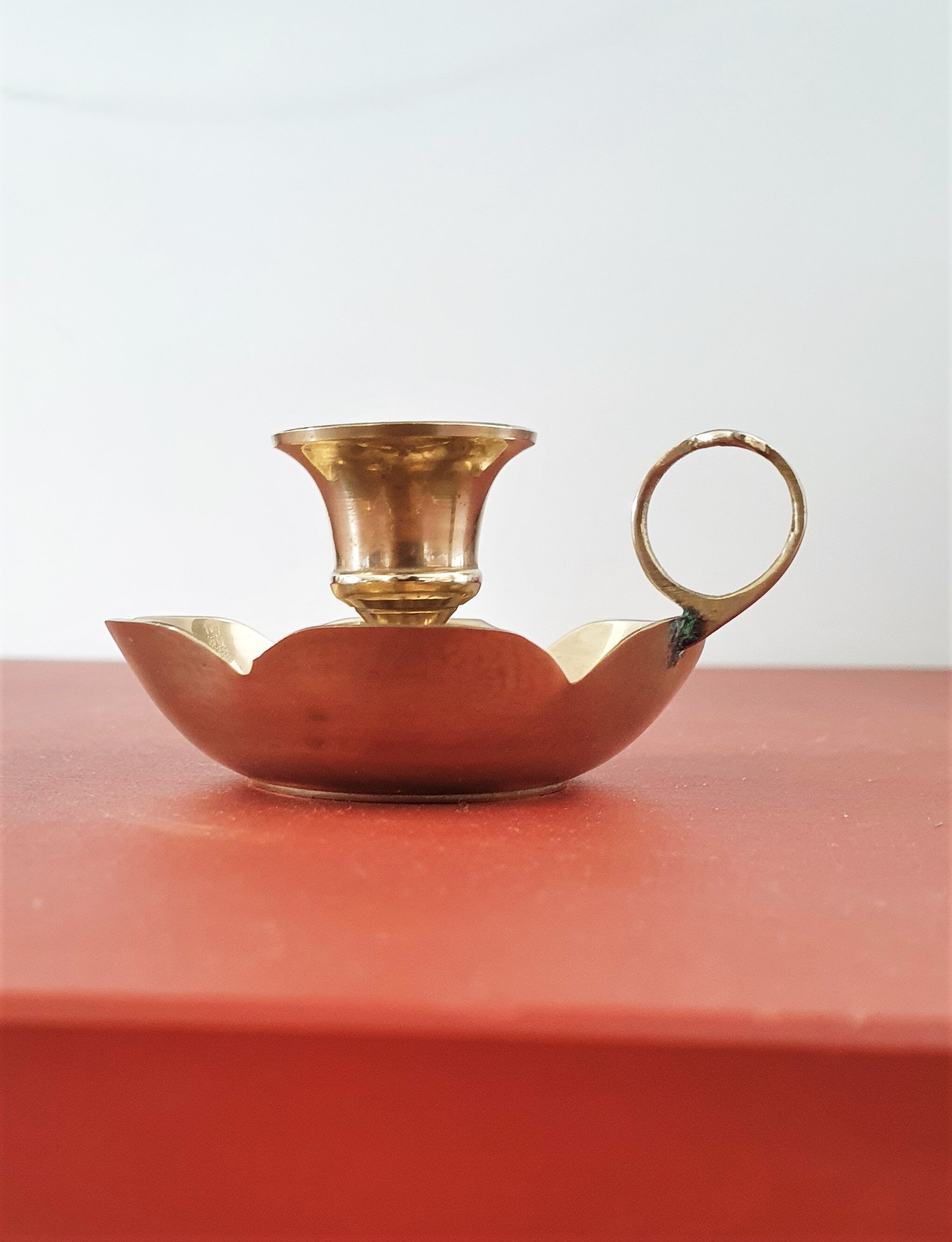 Golden brass candle holder