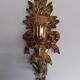 Paire d'appliques en bois doré sculpté, Italie