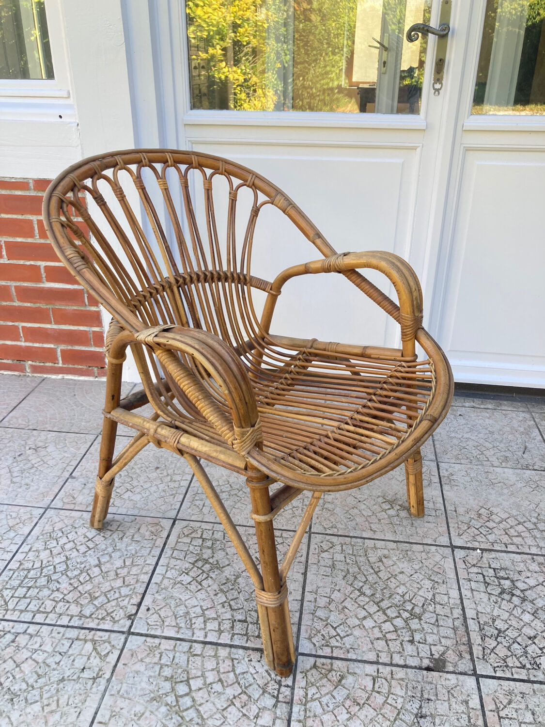 Vintage shell rattan armchair