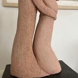 Terracotta sculpture of an entwined couple.