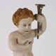Ancient sculpture of a putto in carved and gilded wood, Italy, 19th century.