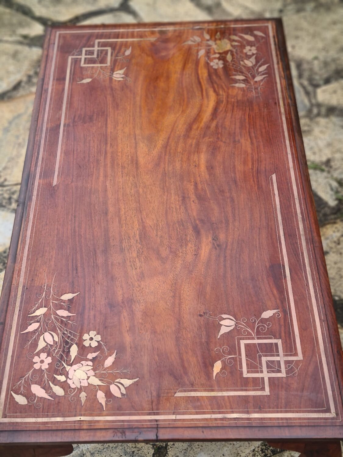 Coffee table in brass marquetry