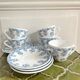 5 coffee cups with blue flower decor from the 70s