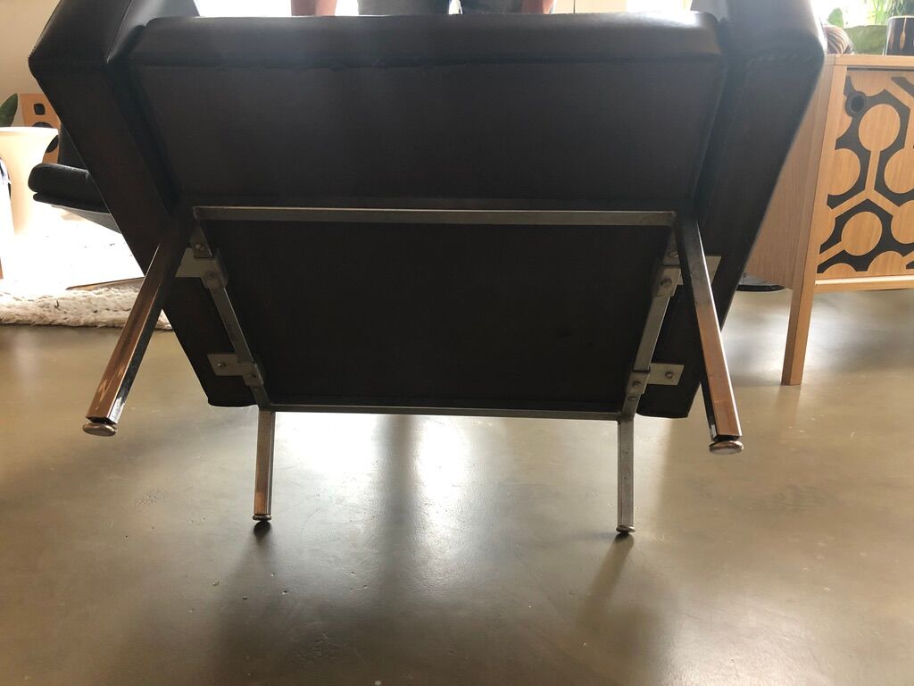 Vintage armchair in black skaï